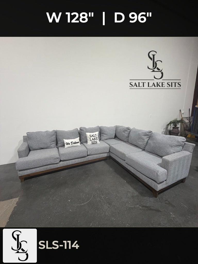 Gray L-Shaped Sectional with Wood Base