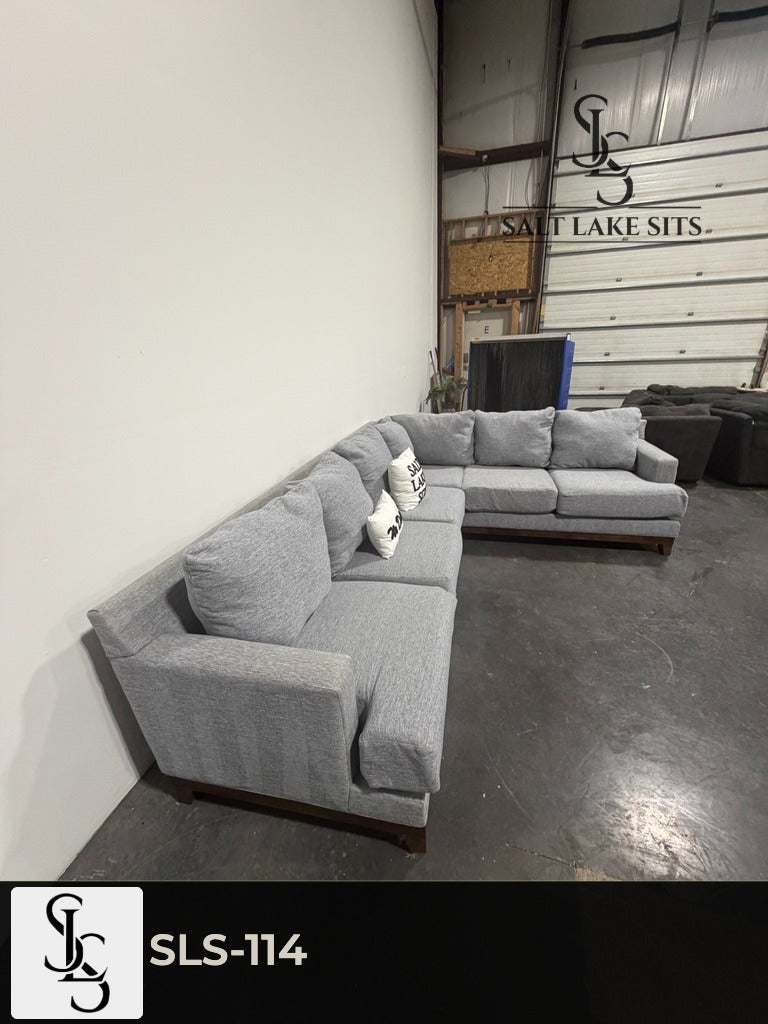 Gray L-Shaped Sectional with Wood Base